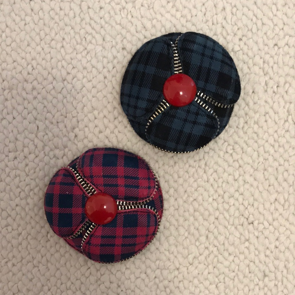 Two Marc by Marc Jacobs brooches